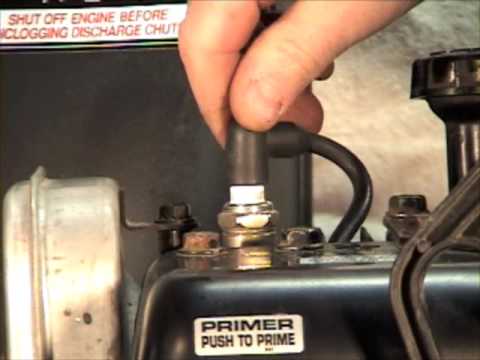 Spark plug replacement in 2 stage snow thrower.