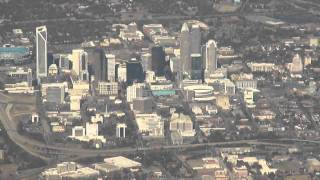 preview picture of video 'Takeoff at Charlotte (CLT) on 18L with close-up view of downtown Charlotte 2010-11-13'