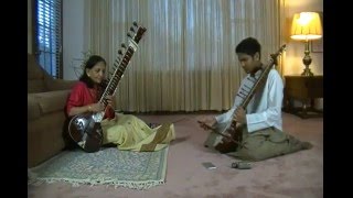 Hasu Patel teaching Raga 'Yaman Kalyan' to Tejas Nair on Esraj