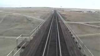 preview picture of video 'Empire Builder eastbound Crossing Trestle Cut Bank, MT 2007-11'