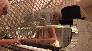 Playing on the late great Liberace’s piano..location secret!