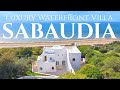 Seaside Serenity INSIDE Sabaudia S Luxurious WATERFRONT VILLA For Sale Lionard