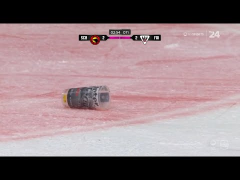 Bern Fans throw trash on ice in OT in play
