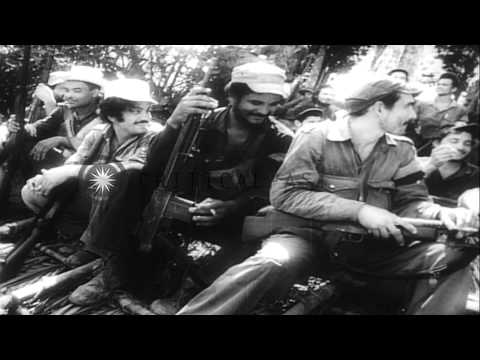 Fidel Castro and his army fight against Batista's forces in Oriente province of C...HD Stock Footage