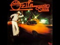 John Ozila - L'Orange Bleue 
