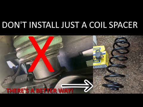 Installing a 2.5" lift coil spring from Skyjacker in the rear of a GMT800 Yukon / Suburban / Tahoe