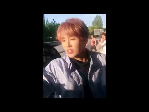 190530 Li Wenhan helps fan out of the way of oncoming car (cr. logo)