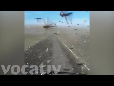 Truck Drives Through Massive Swarm of Locusts In Dagestan, Russia