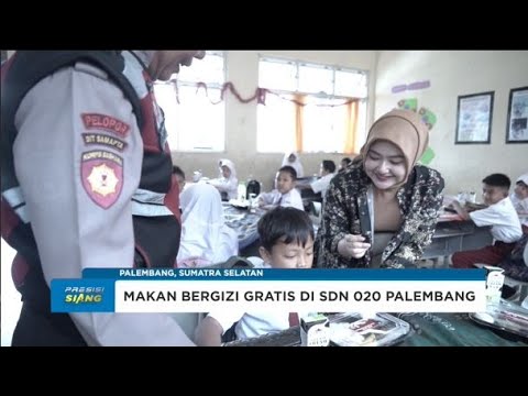 POLDA SUMSEL BAGIKAN MAKAN BERGIZI GRATIS DI SDN 020 PALEMBANG