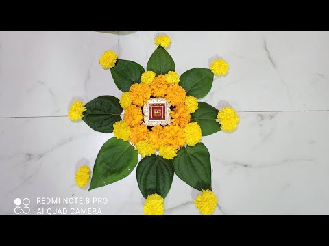 Simple Rangoli of flowers by spruha