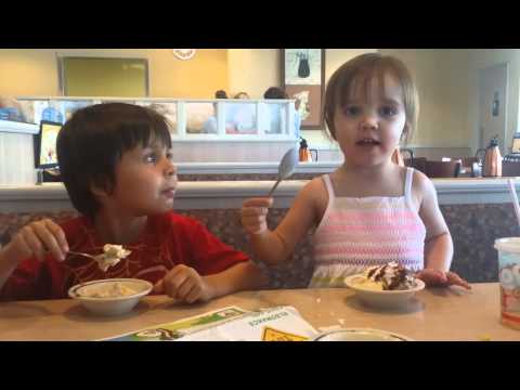 Little girl LOVES ice cream!!! Look at her face!