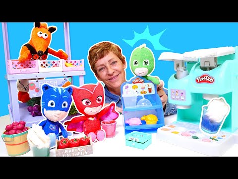 Die Pyjamahelden und Nicole machen Milchshakes. Spielzeuge für Kinder. Spielspaß mit Play Doh