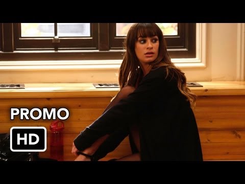 Glee 'Glease' promo frame emphasizing stage lights and leather-jacket silhouettes