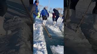 The process of mining ice cubemv from frozen lakes