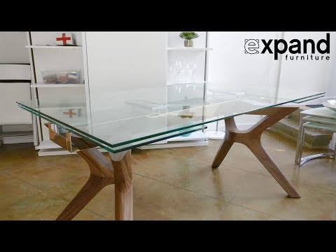 Bridge extending glass table with wood legs