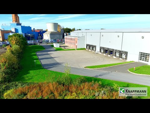 Grüne und nachhaltige Außenanlage für eine Gewerbehalle | Referenz | Weißenburgerstraße in Dortmund