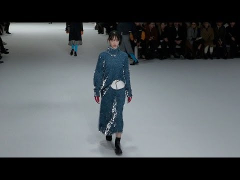 Models and designer on the runway for the Sportmax Fashion Show