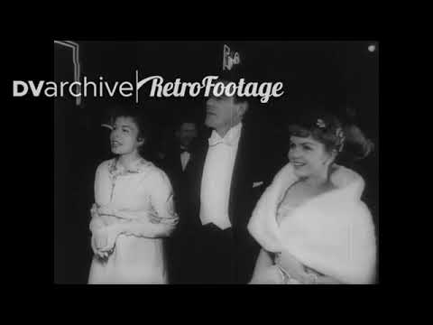 1958 - Debbie Reynolds is seen arriving at the Academy Awards ceremony