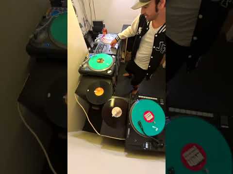 BADDEST DJ ON 8 TURNTABLES