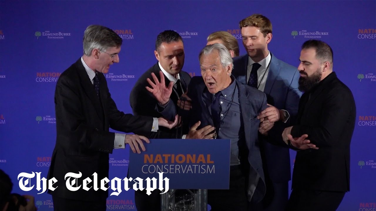 Image of Watch: Extinction Rebellion rush stage during Jacob Rees-Mogg speech