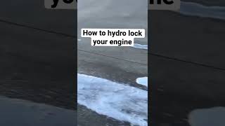 Hydro locking an engine with a pressure washer