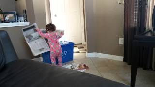 Kayla putting the paper in the recycle bin