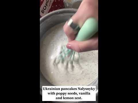 Ukrainian pancakes Nalysnyky with poppy seeds, vanilla and lemon zest. Doctor’s dessert.