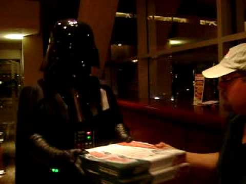 Darth Vader picking up Pizza.