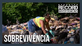 Famílias perdem a renda na pandemia e vão morar ao redor de lixão para ter o que comer