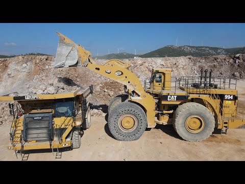 Huge Caterpillar 994 Wheel Loader Loading Caterpillar 777F Dump Truck - Samaras Mining Group