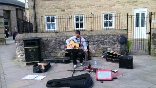 Heart of Gold, Neil Young busking cover.