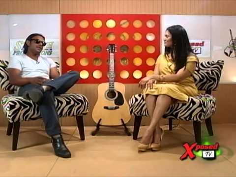 Neeshan D Hitman on Xposed TV [ 2014 ] Hosted by: Sarah Bacchus