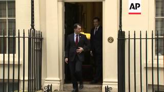 Wisconsin Gov. Scott Walker, visiting London on a trade mission, met a top British finance official