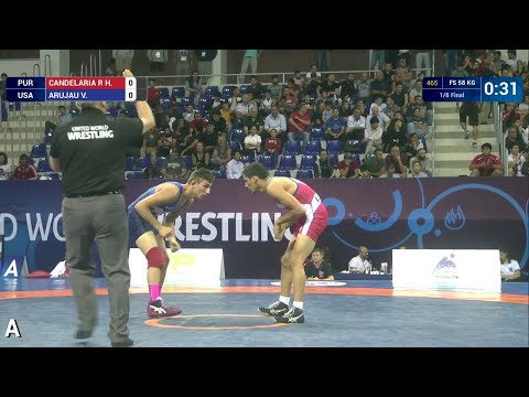 1/8 FS - 58 kg: V. ARUJAU (USA) df. H. CANDELARIA R (PUR) by TF, 10-0
