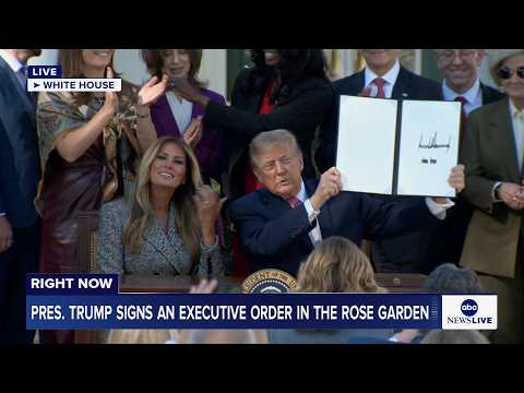 President Trump signs an executive order in the Rose Garden