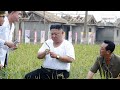 Kim Jong-un inspects flood-hit village after typhoon, wearing an inner shirt