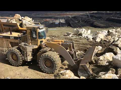 Caterpillar 988F Wheel Loader Loading Stones On Komatsu Dumpers - Kivos Ate