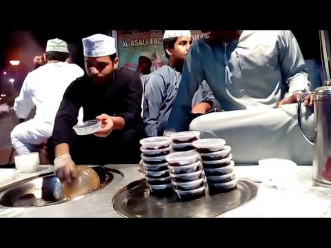 Traditional Omani halwa making in Muscat festival in Oman