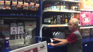 Demo of the cigarette machine being piloted by NTUC FairPrice