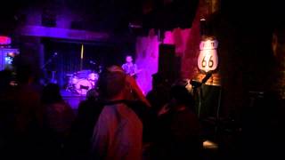 Buzzes Like Neon by Adam Hood