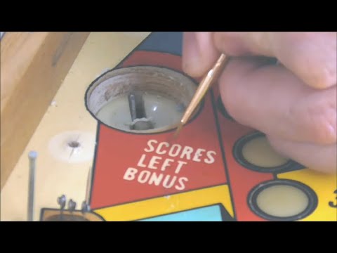 Touching up the paint on a Williams Grand Prix Electromechanical Pinball Machine Playfield! -2