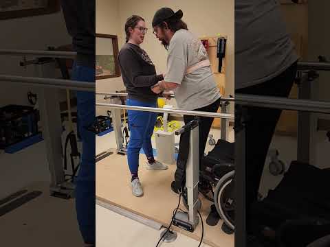 Parallel bars  forward and backwards  pt with Emily 2/11/26