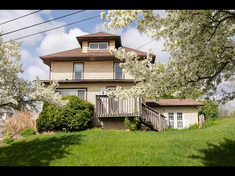 Bright, freshly painted home with HUGE garage space! property video