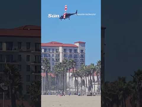 Heartstopping moment helicopter spins out of control and crashes to ground