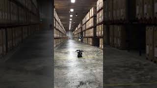 Infinium Scan Drone landing autonomously in a warehouse - automated inventory stock-taking by drones