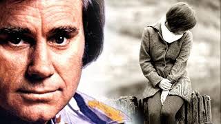 Wine Colored Roses by George Jones from his album 16 Biggest Hits