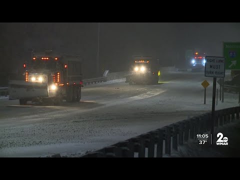 Drivers deal with snowy, slushy roads