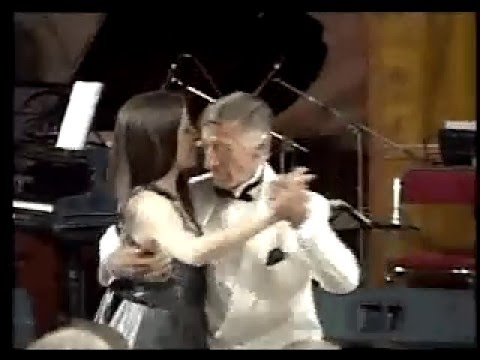  Ludmila Apartin  and  Dany Garcia  are  dancing  to  the  milonga  "  Ella Es Asi  "