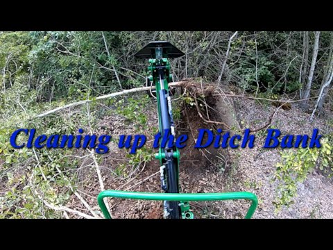 Cleaning up the Ditch Bank and Moving a Dirt Pile