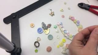 Time lapse video creating a button wedding horseshoe